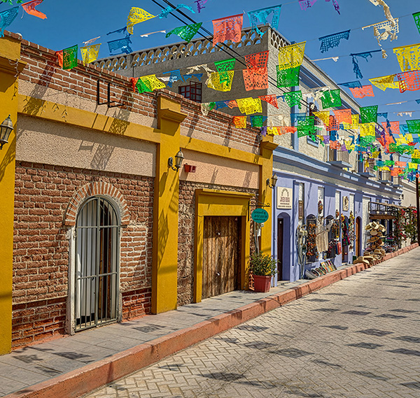 a street with colorful flags