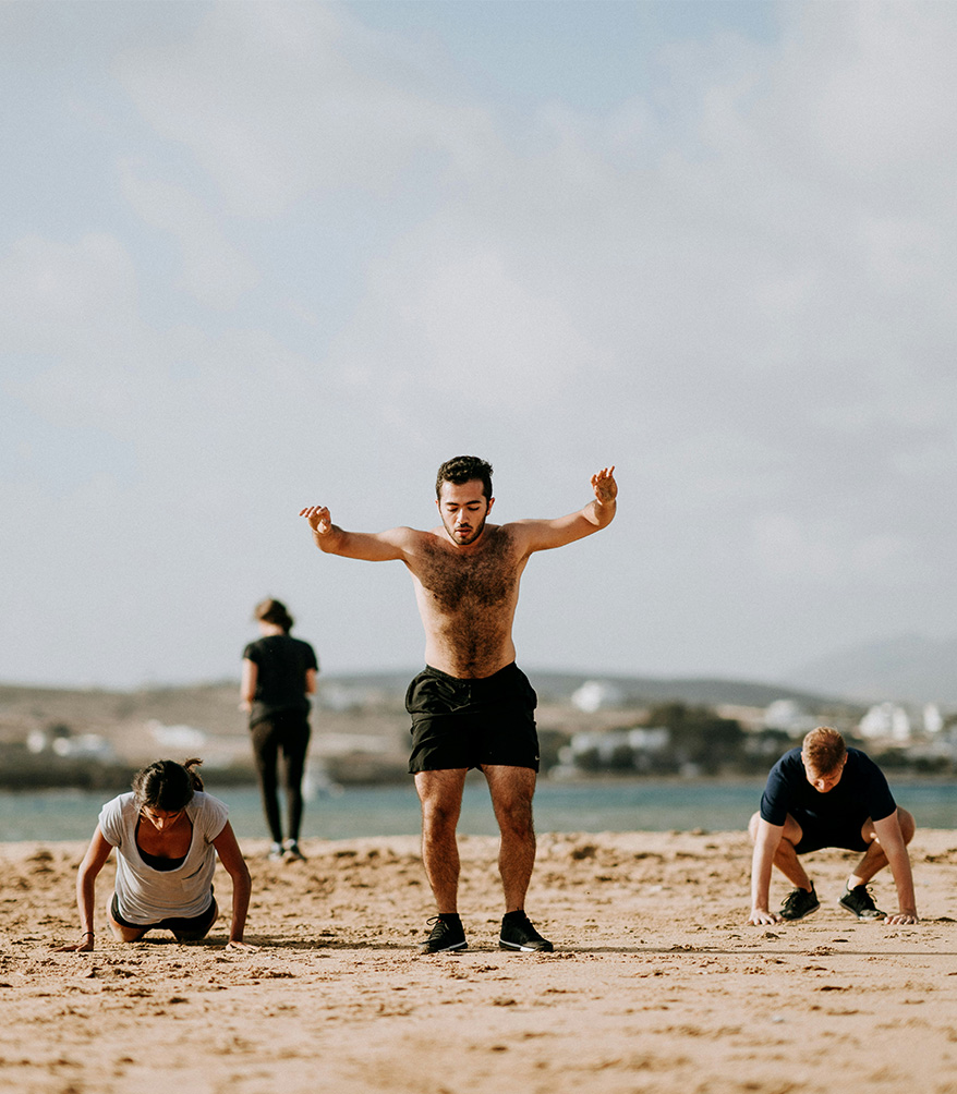 a group of people on a beach