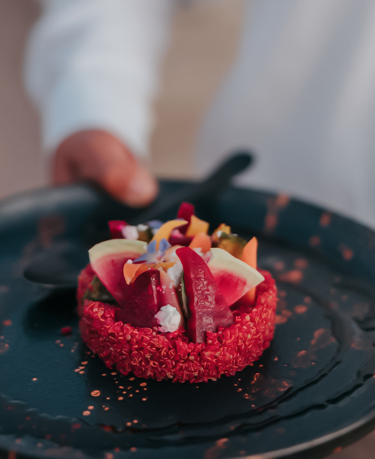 a plate of food with a spoon