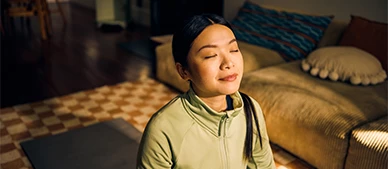 a woman with her eyes closed