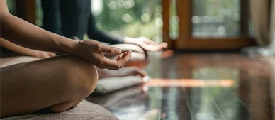 a close-up of hands in a meditating position