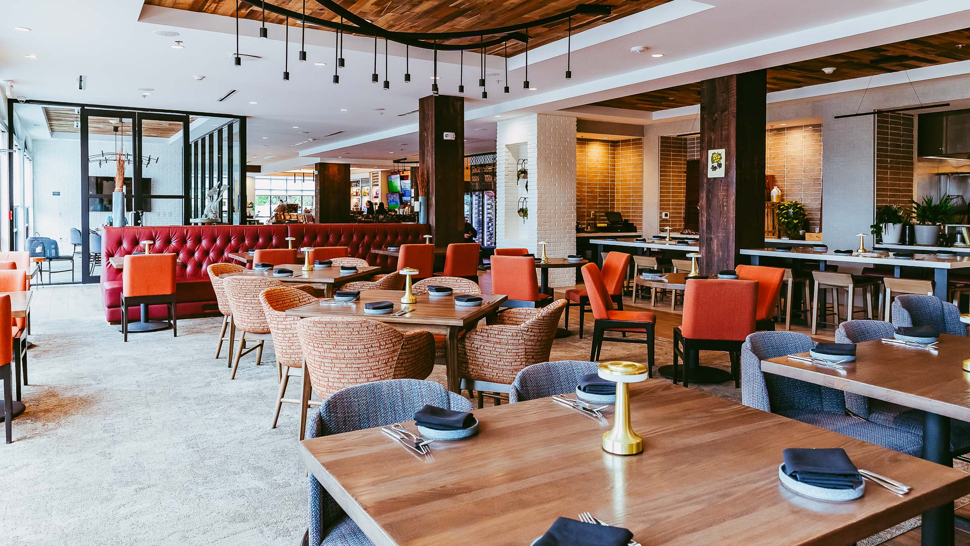 a restaurant with tables and chairs