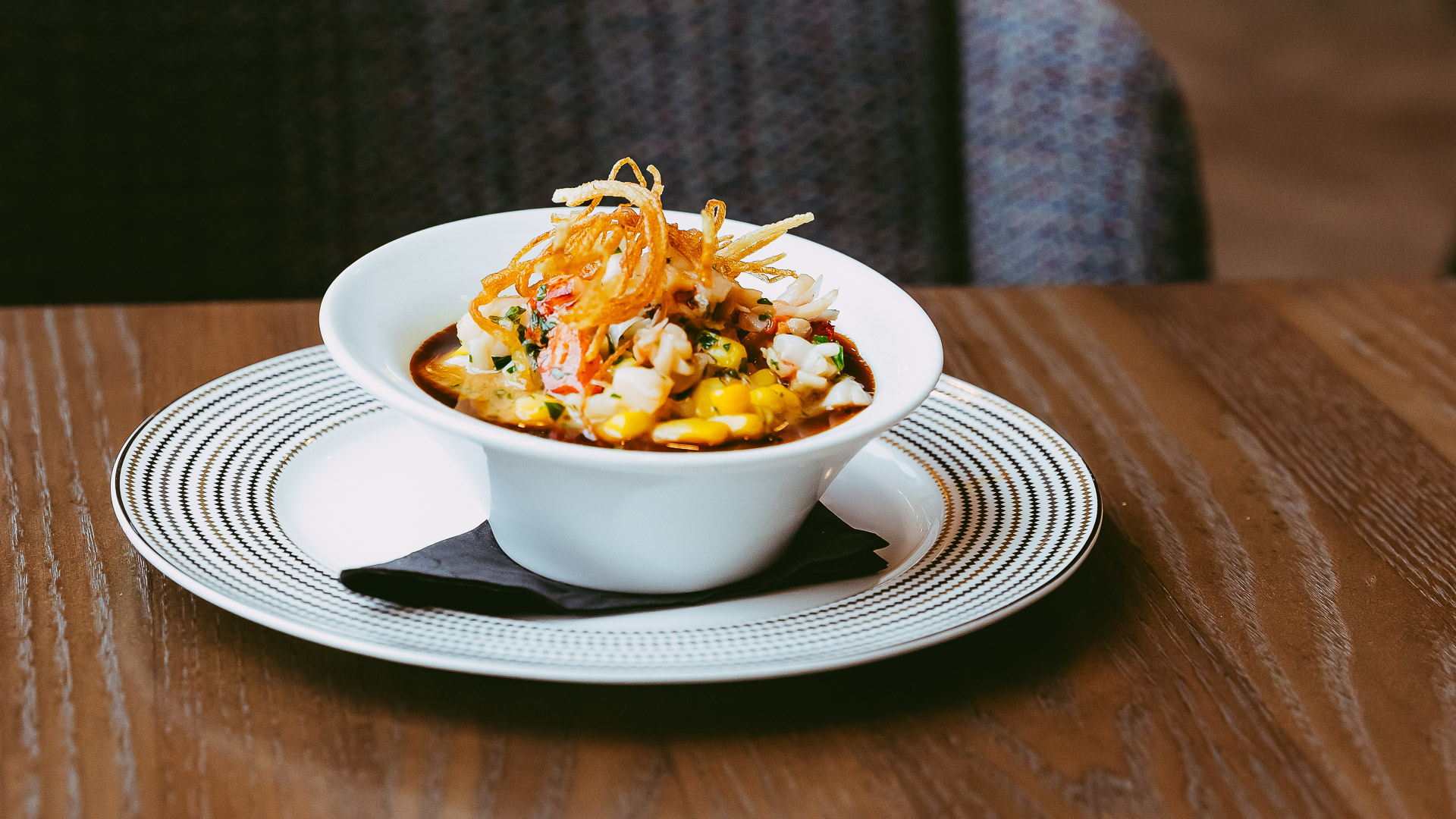 a bowl of soup on a plate