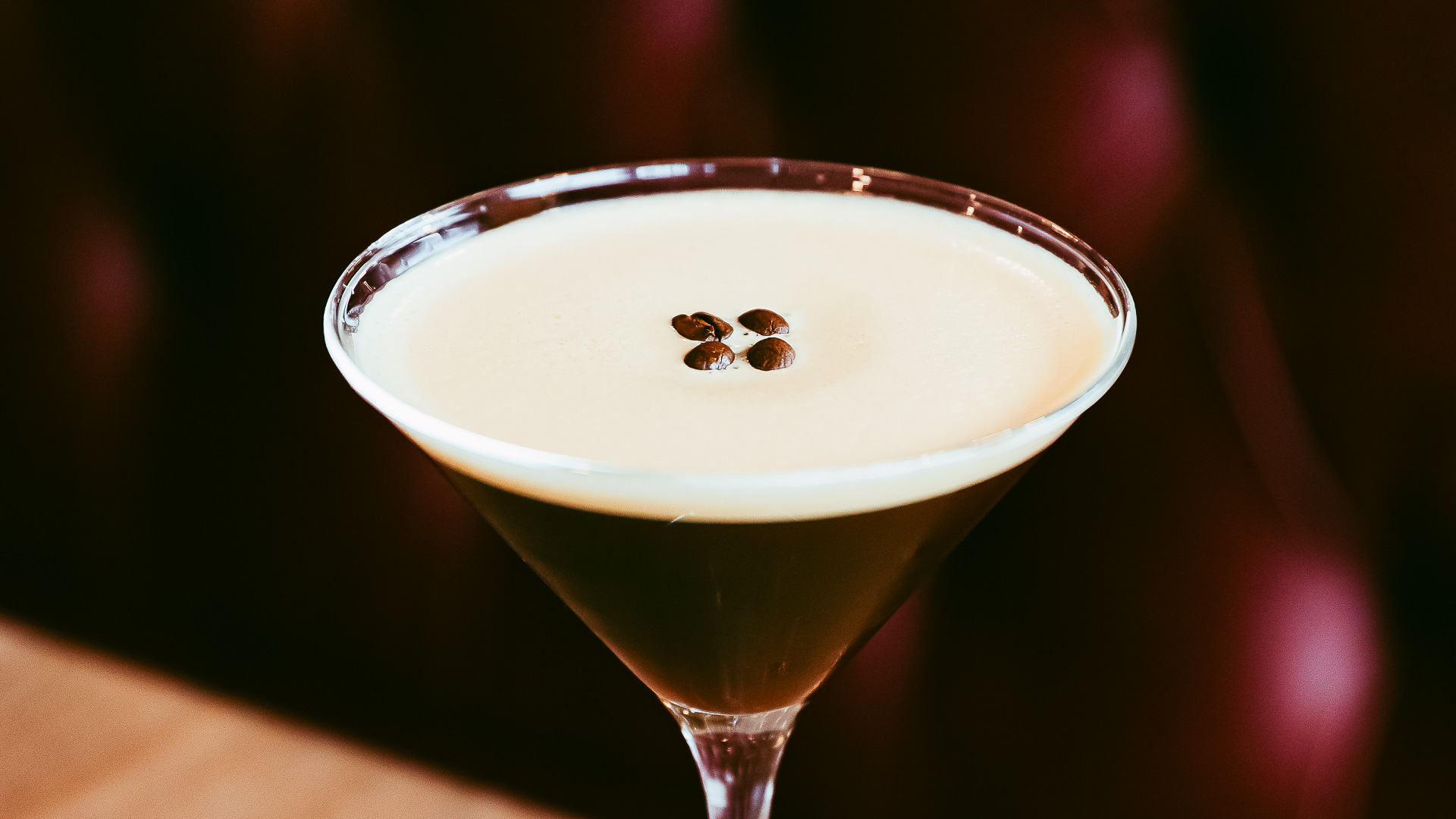 a glass with a drink in it