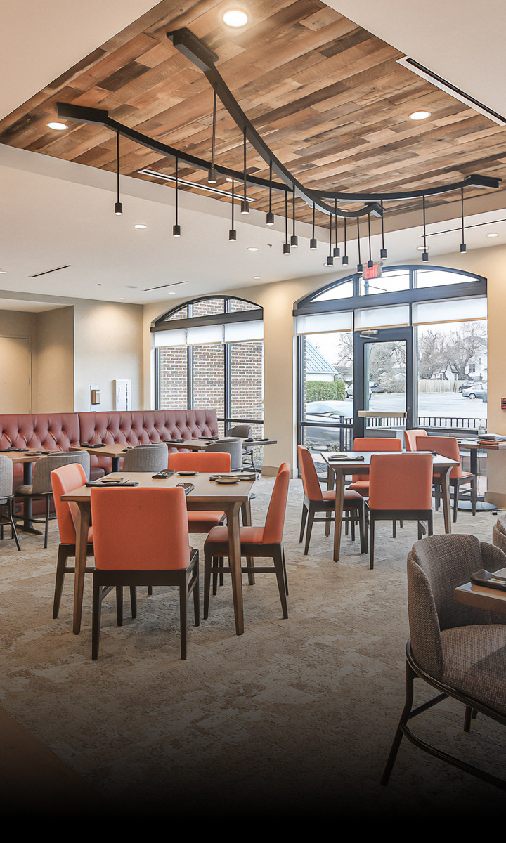 a room with tables and chairs