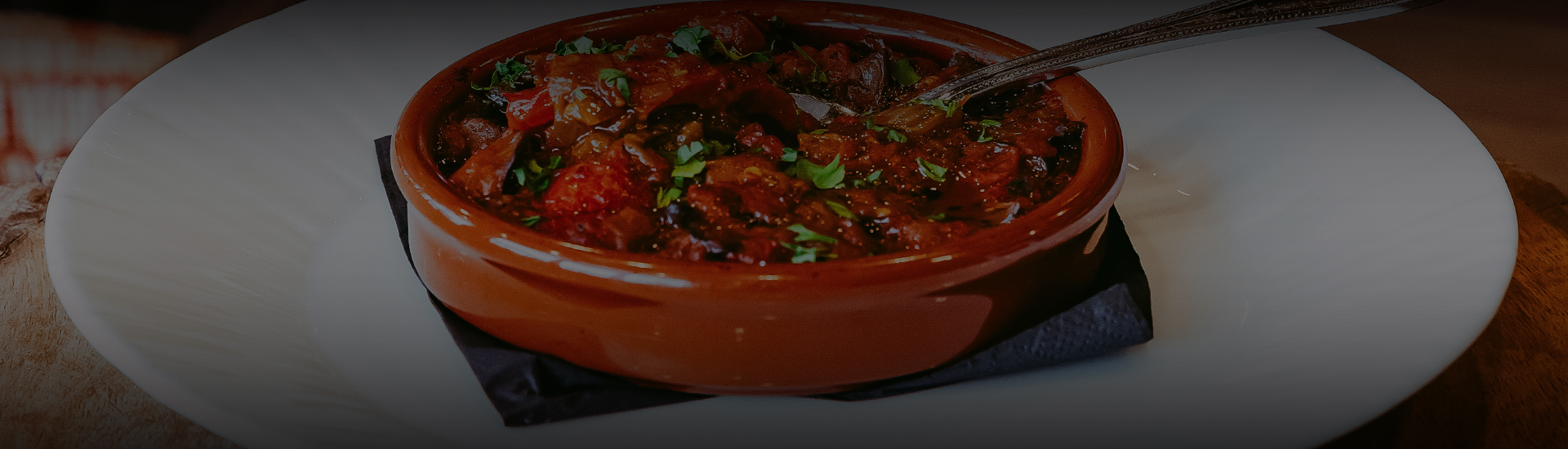 a bowl of food with a fork