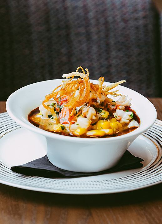 a bowl of soup on a plate