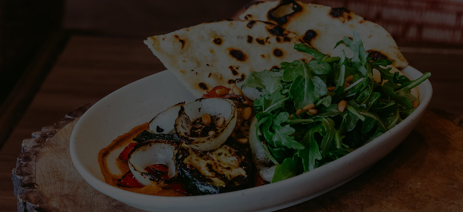 a plate of food with a tortilla and a tortilla