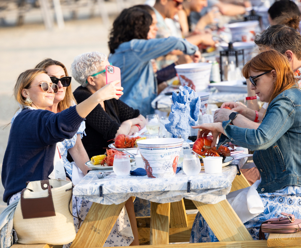 a group of people sitting at a table