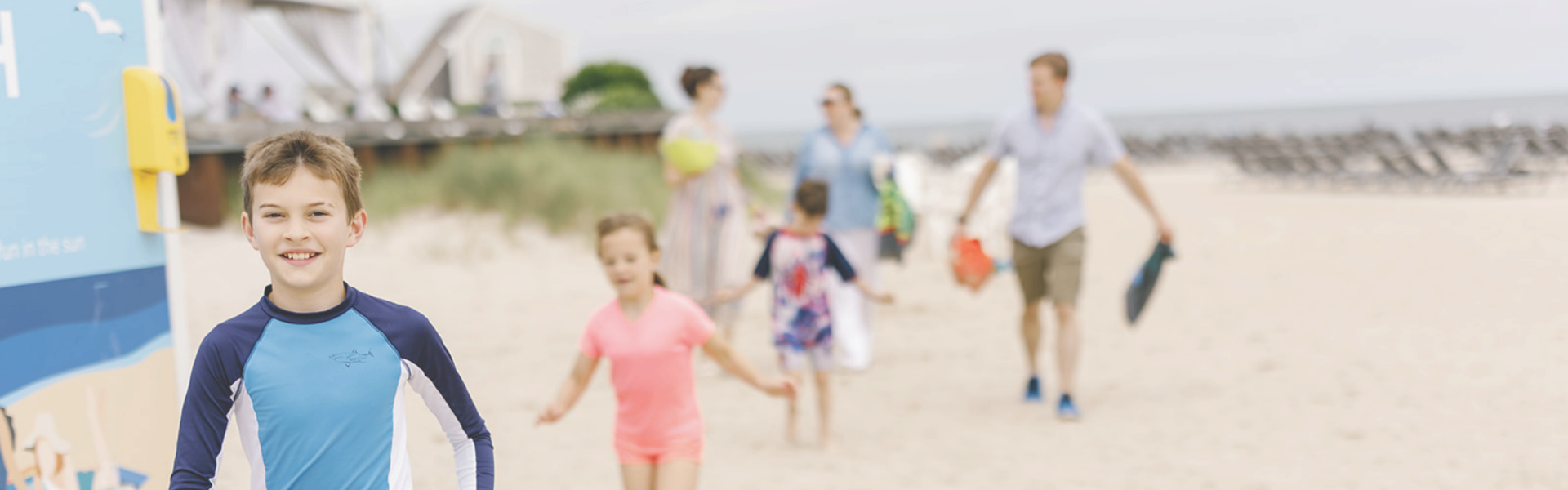 a group of people on a beach
