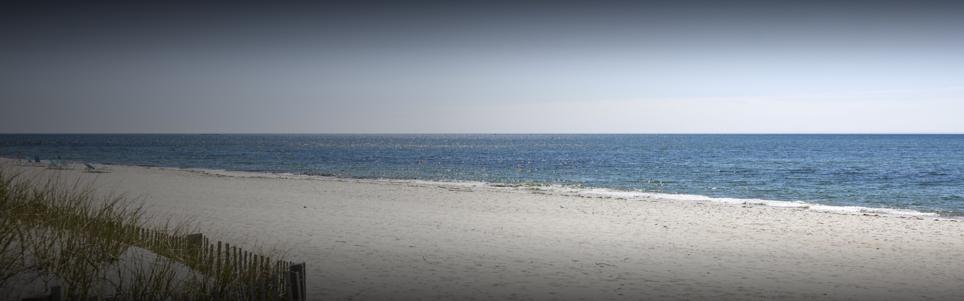 a beach with a body of water