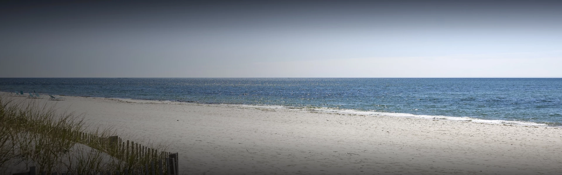 a beach with a body of water