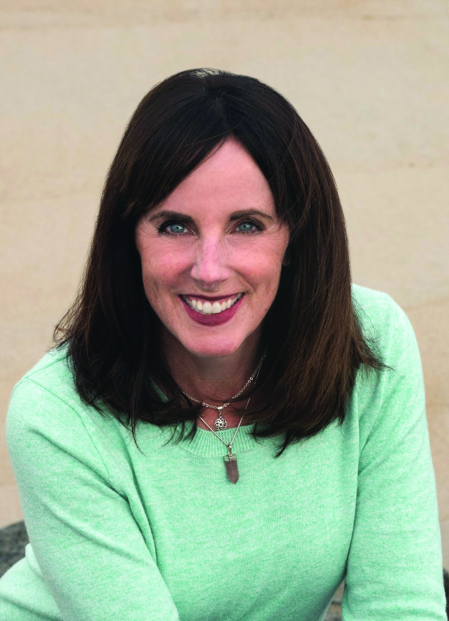 a woman smiling at the camera