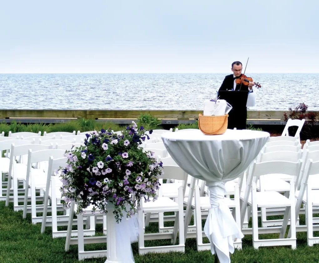 Wedding ceremony on the Oceanfront Lawn at Red Jacket Beach Resort overlooking Nantucket Sound