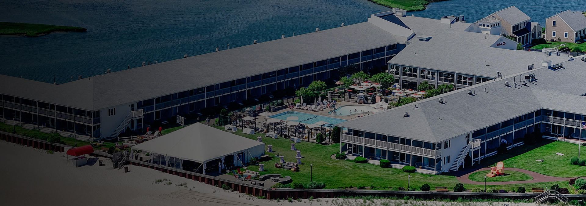 a swimming pool and a building by the water