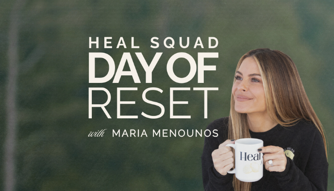 a woman holding a mug