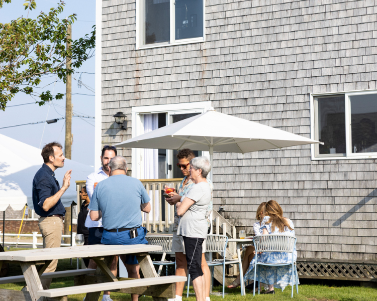 a group of people outside a building