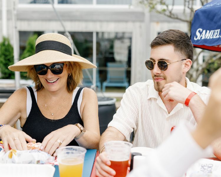 a group of people sitting at a table