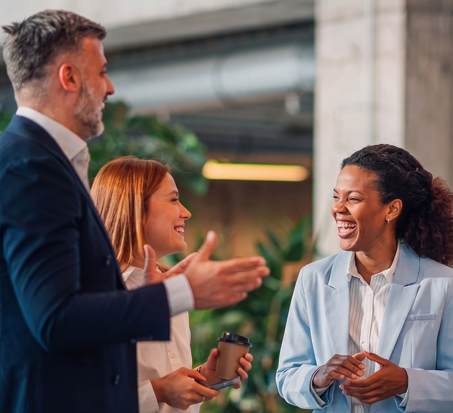 a group of people laughing and talking