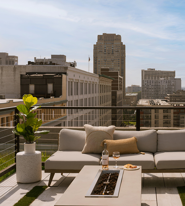 a couch and a table on a rooftop