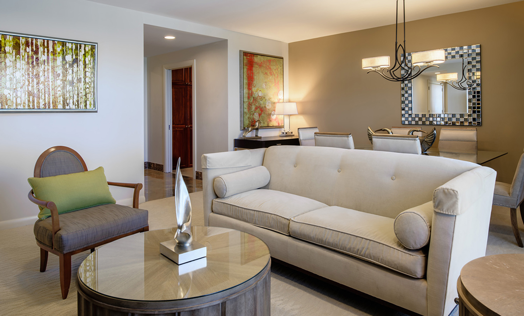 a living room with a couch and a table