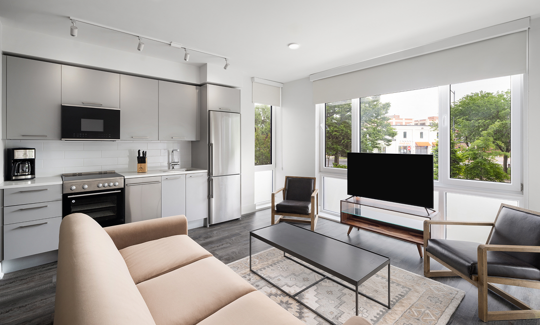 a living room with a couch and a television