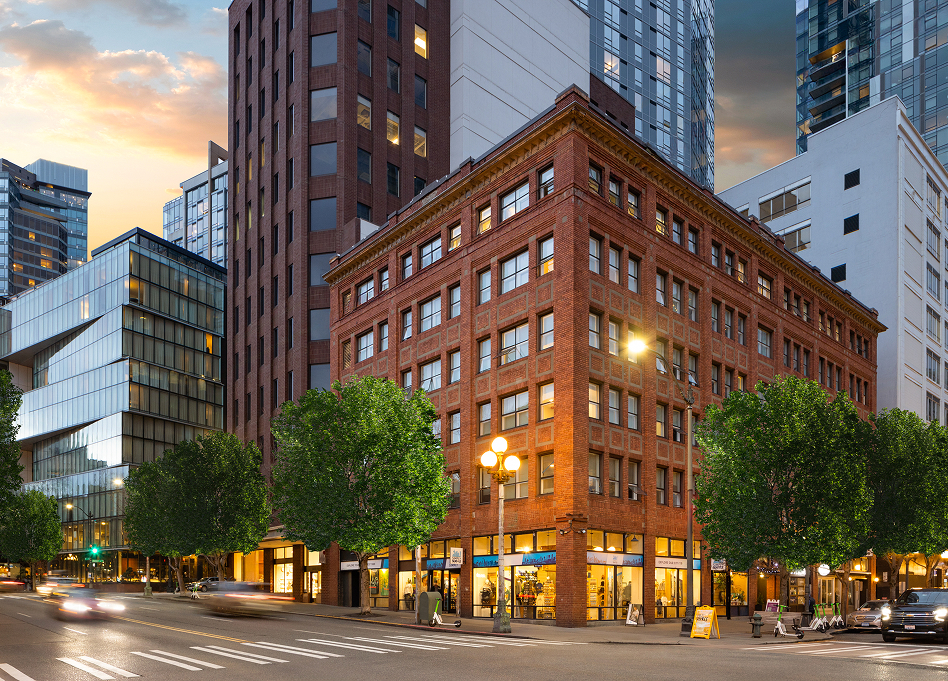 a city street with buildings and trees