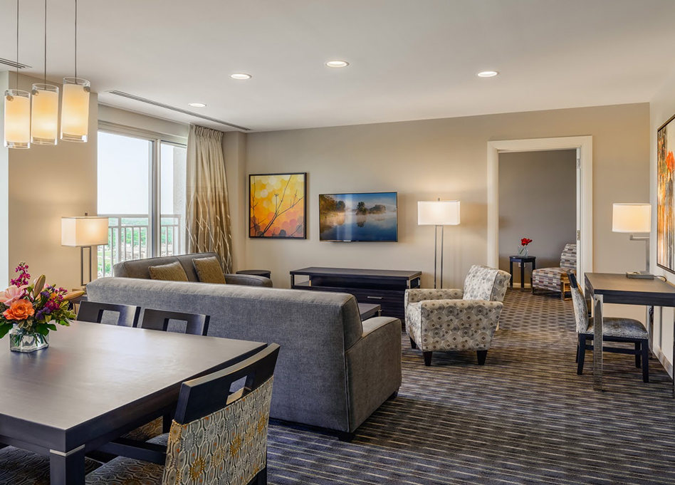 a room with couches and chairs