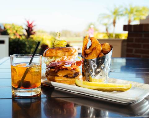a plate of food and a drink on a table