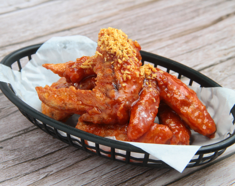 a basket of chicken wings