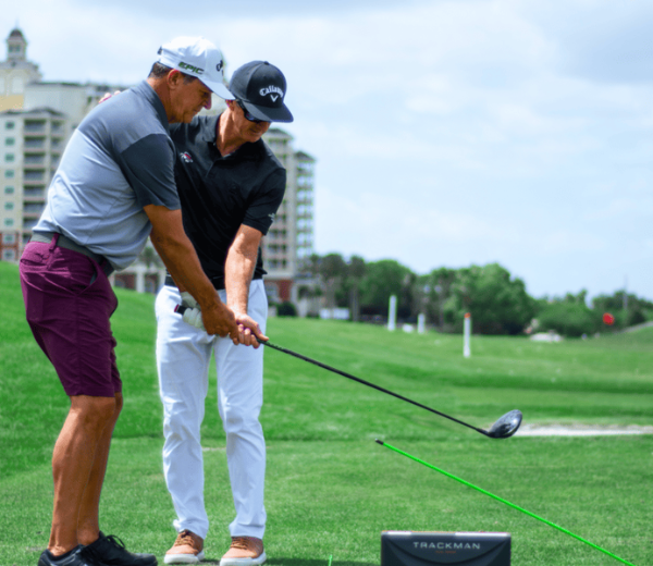 two men on a golf course