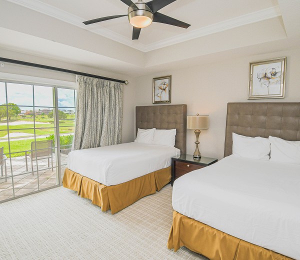 a bedroom with two beds