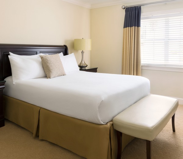 a bed with a white bed