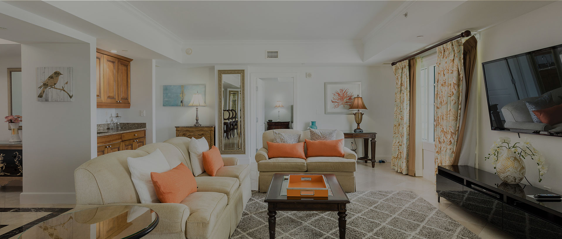 living room with orange accents dark overlay