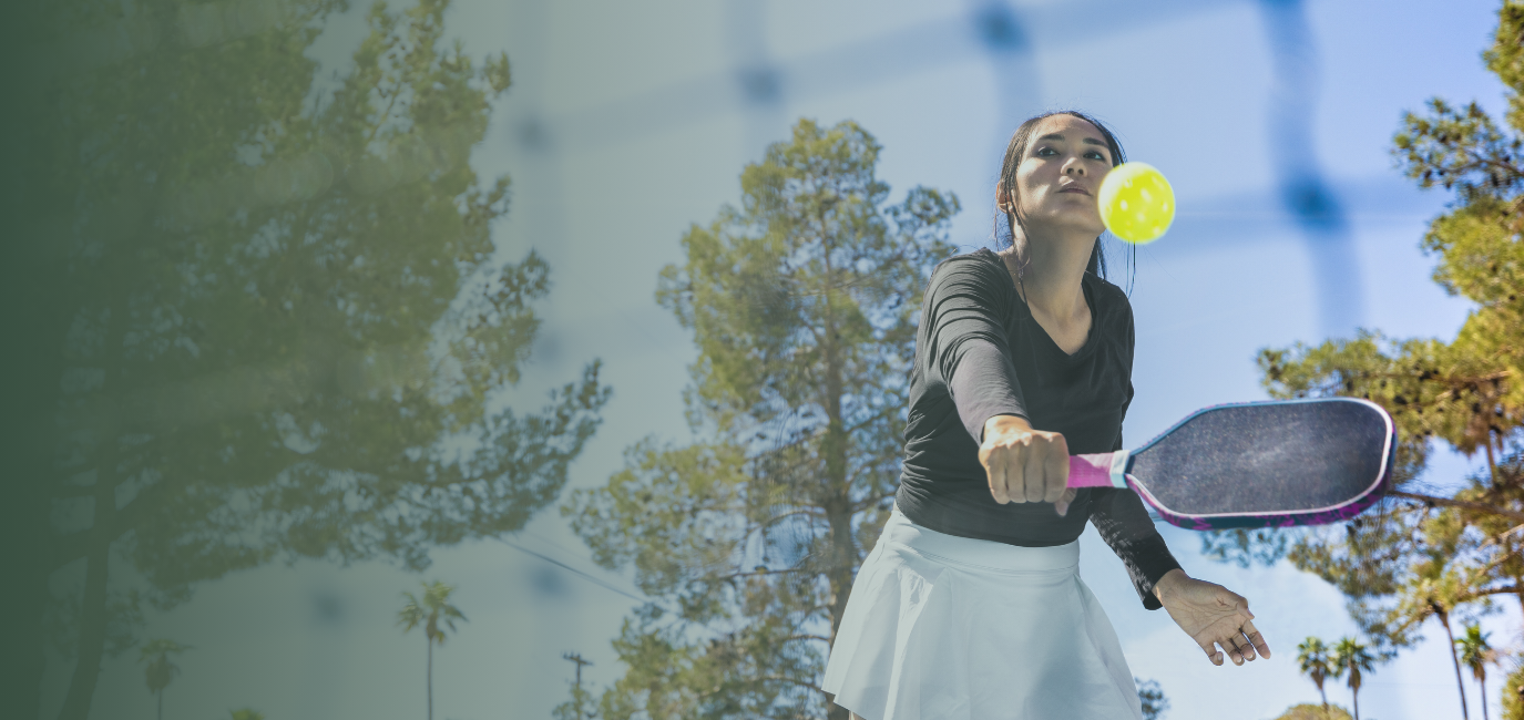 a woman holding a tennis racket