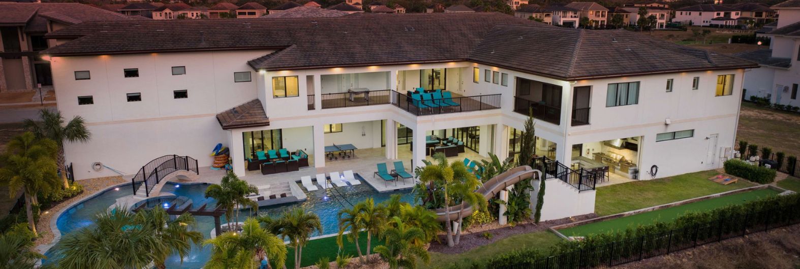 a house with a pool and a slide