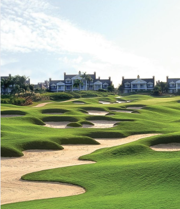 a golf course with sand bunkers