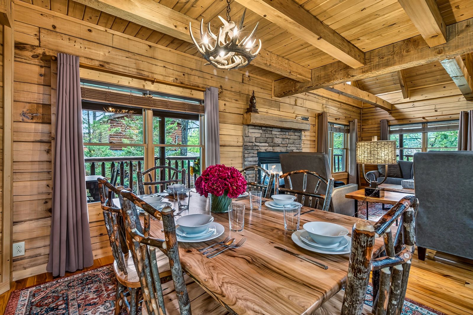 a dining table in a log cabin