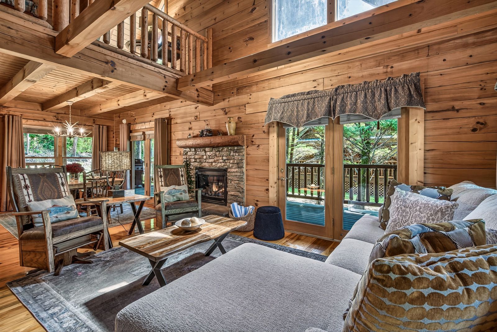 a living room with a fireplace and a couch