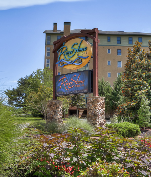 a sign in front of a building