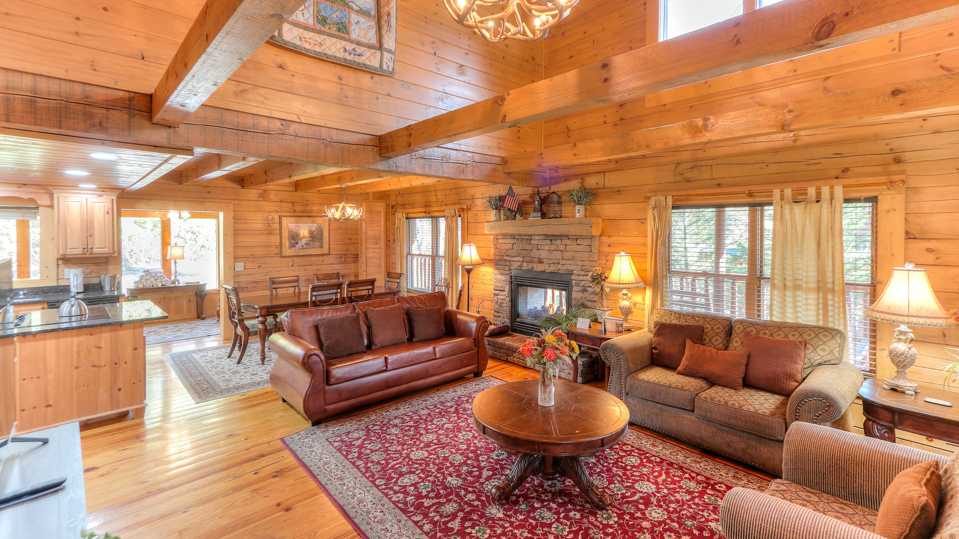 a living room with a fireplace and couches
