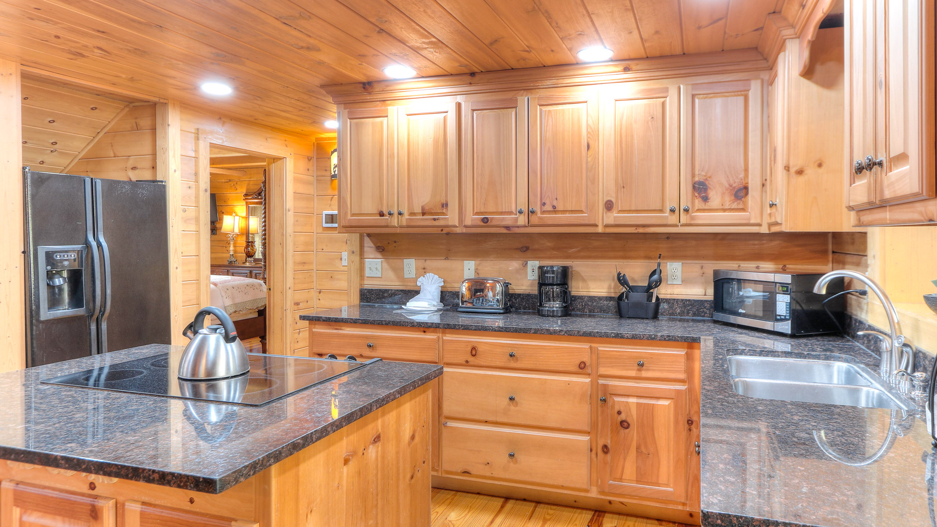 a kitchen with a stove and appliances