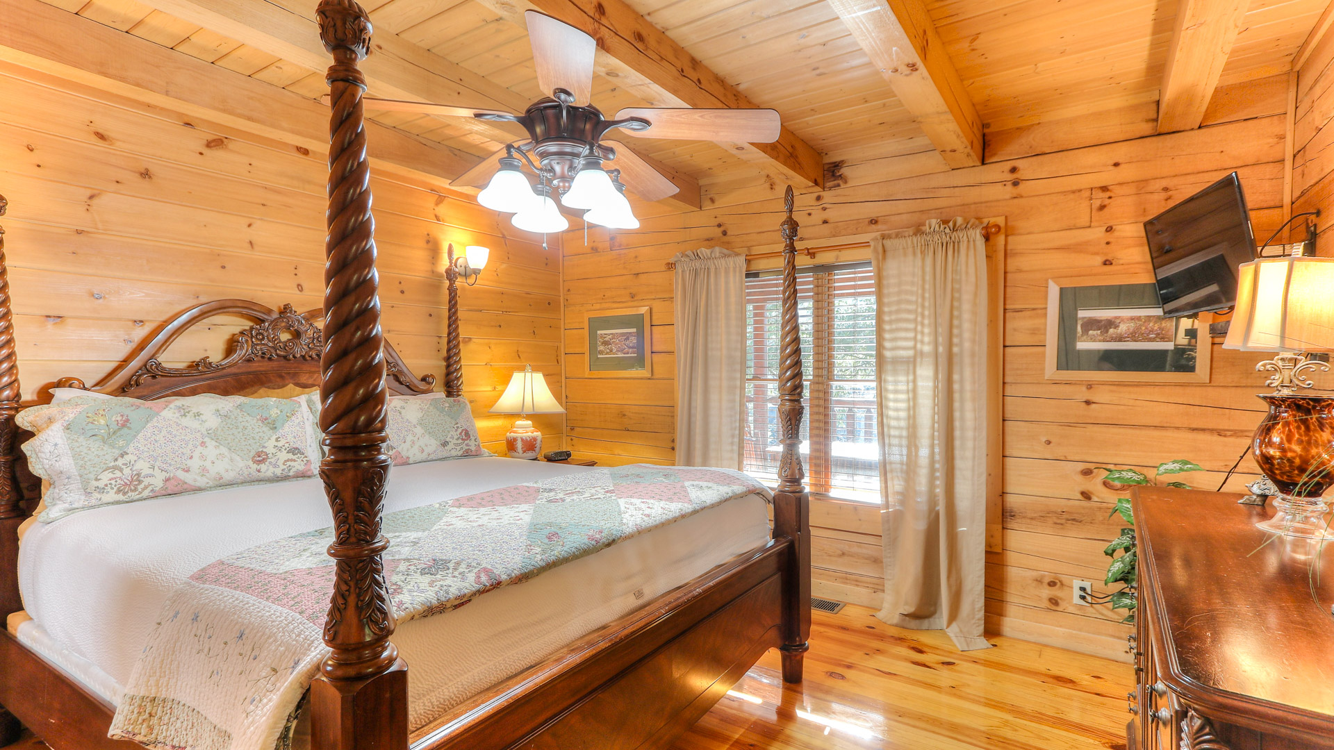 a wooden bed in a log cabin