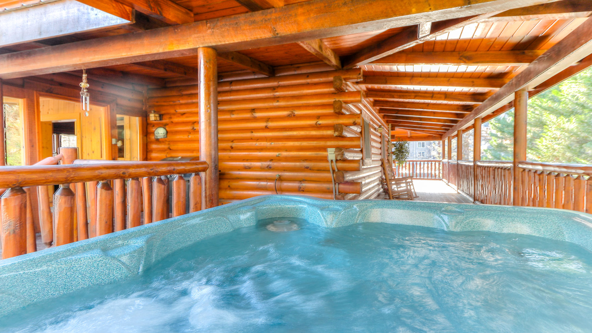 a hot tub in a log cabin