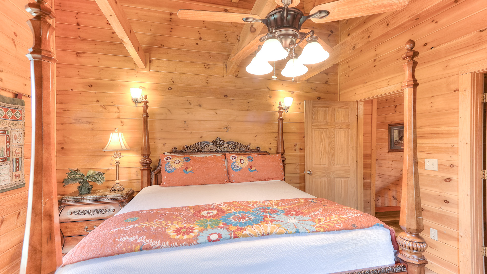 a bed in a wooden room