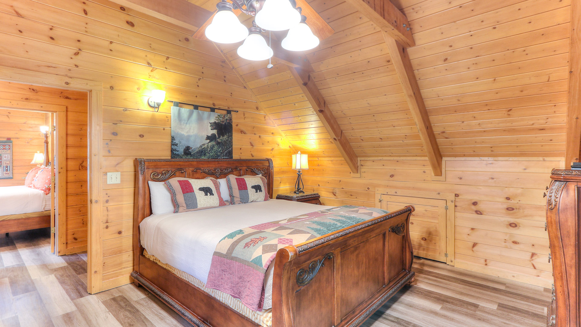 a bed in a wooden room