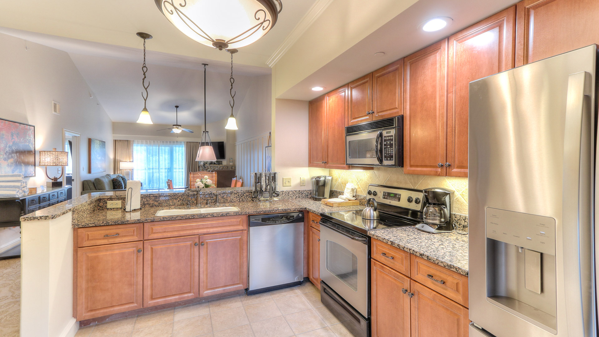 a kitchen with granite counter tops and granite counter tops