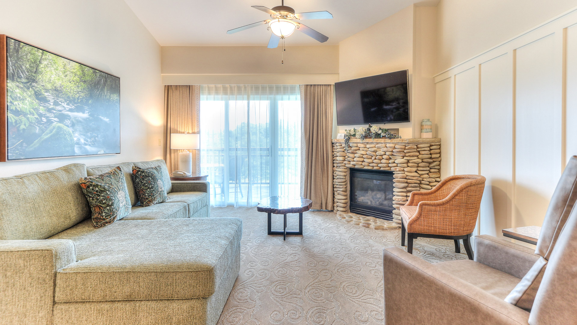 a living room with a fireplace and couches