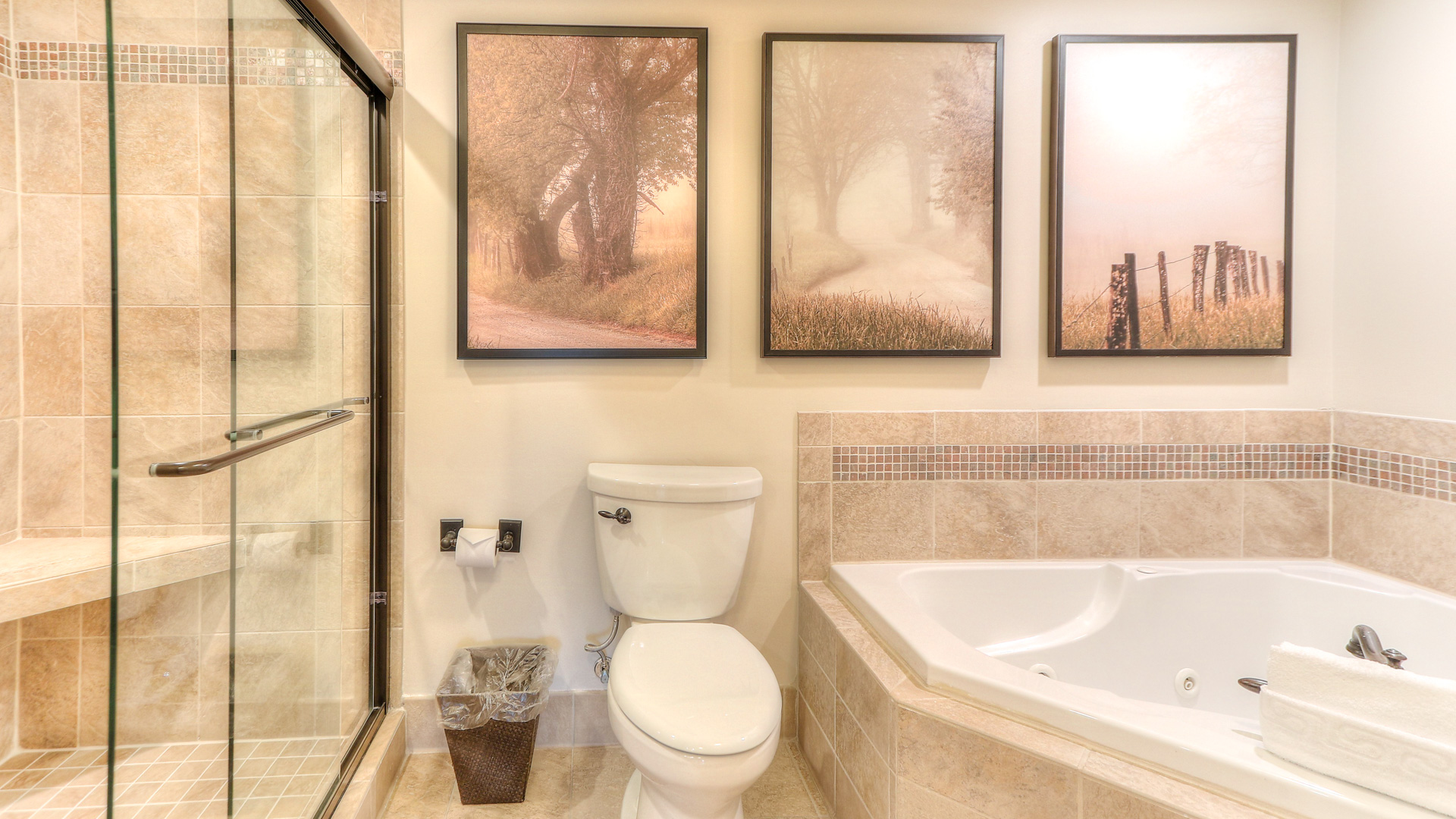 a bathroom with a tub and a toilet