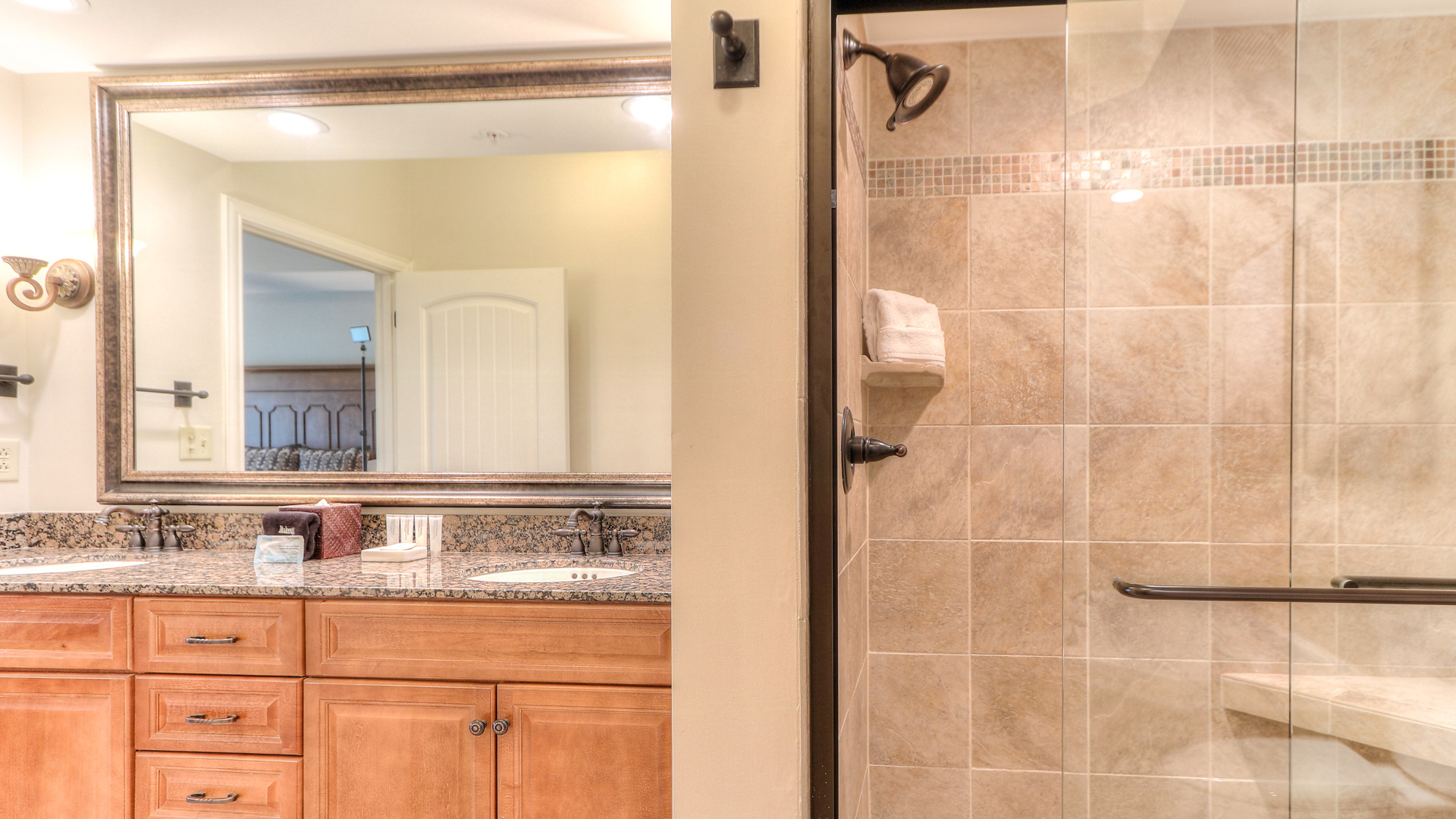 a bathroom with a shower and sink
